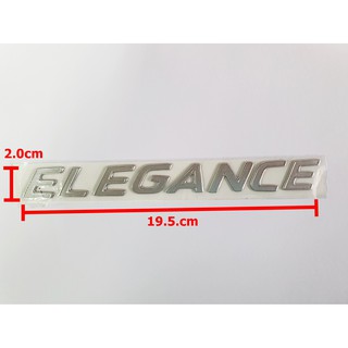 ป้ายโลโก้ ELEGANCE สำหรับติดท้าย Mazda 2,3 ขนาด 19.5x2.0cm ติดตั้งด้วยเทปกาวสองหน้าด้านหลัง