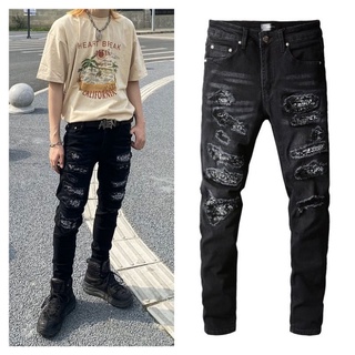 Amiri black new patch holes fold slim jean