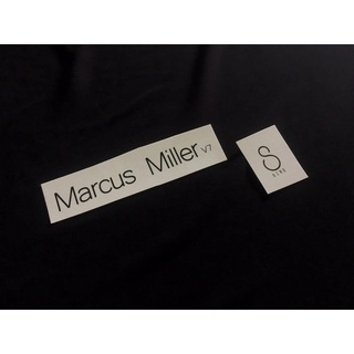 โลโก้หัวกีต้าร์ Marcus Miller V7