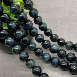 ไทเกอร์อายน้ำเงินเข้ม  (Deep Blue Tiger Eye)  8-12mm.  10 เม็ด/set