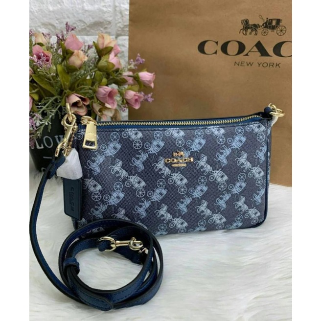 COACH POUCH HORSE AND CARRIAGE PRINT