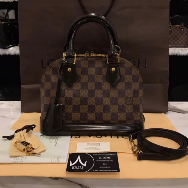 louis vuitton alma used