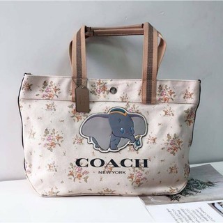 Coach DISNEY X COACH TOTE WITH ROSE BOUQUET PRINT AND DUMBO (COACH 91119)
SV/CHALK MULTI