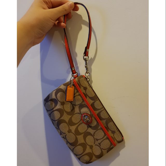 Coach wristlet กระเป๋าคล้องมือ ขนาด 7.5×5 นิ้ว ลายซีสีส้ม พร้อมแคร์การ์ด