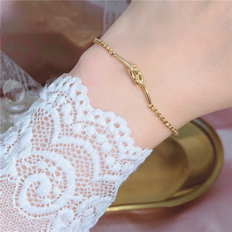 สร้อยข้อมือไทเทเนียมเหล็ก ทอง 18K ประดับโบว์ เครื่องประดับแฟชั่น ของขวัญ
