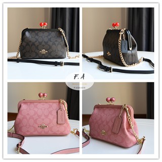 F.A (ของแท้ 100%) COACH 1452 kissslock Lady  kiss lock bag / ladies shoulder messenger bag / super beautiful cherry lock