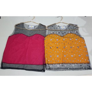 เสื้อแขนกุดตกแต่งผ้าตาข่าย