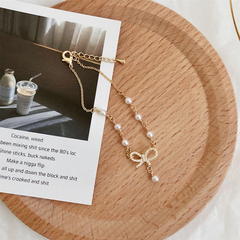 สร้อยข้อมือประดับมุก จี้รูปโบ สำหรับผู้หญิง - รูปที่ 4