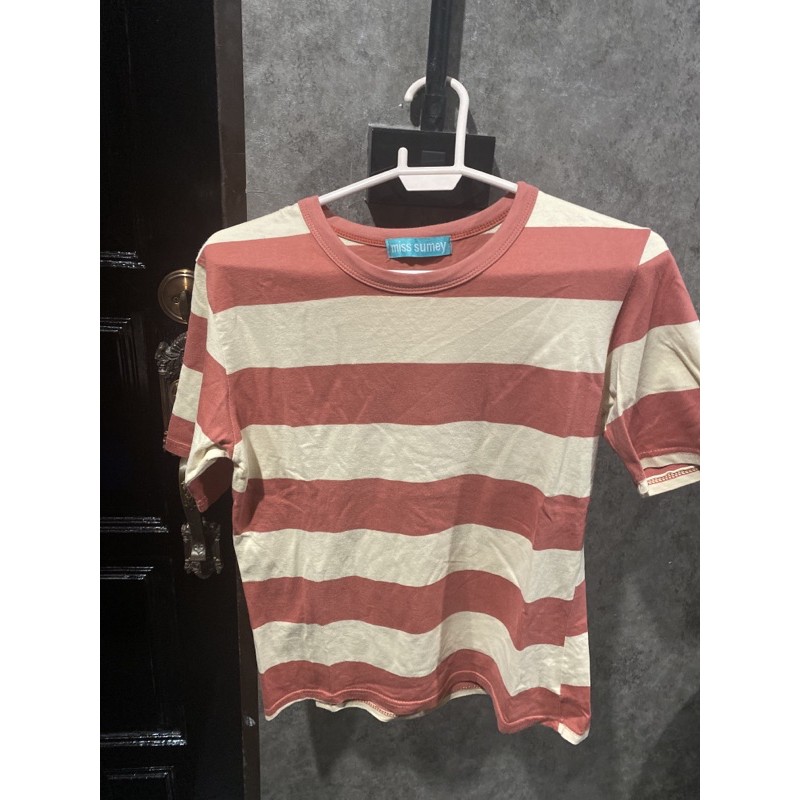 lotus’s salmon T-shirt