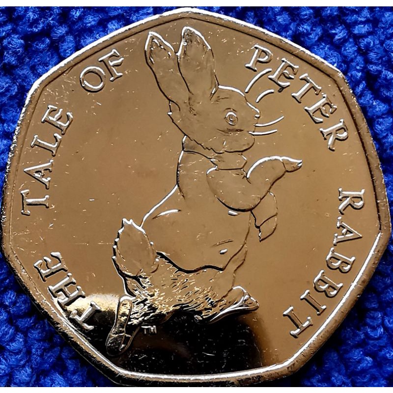 เหรียญ​อังกฤษ​ UK, 50​ Pence, (วาระ​ที่ระลึก​ Peter Rabbit ), #1347T, ไม่​ผ่าน​ใช้​ UNC