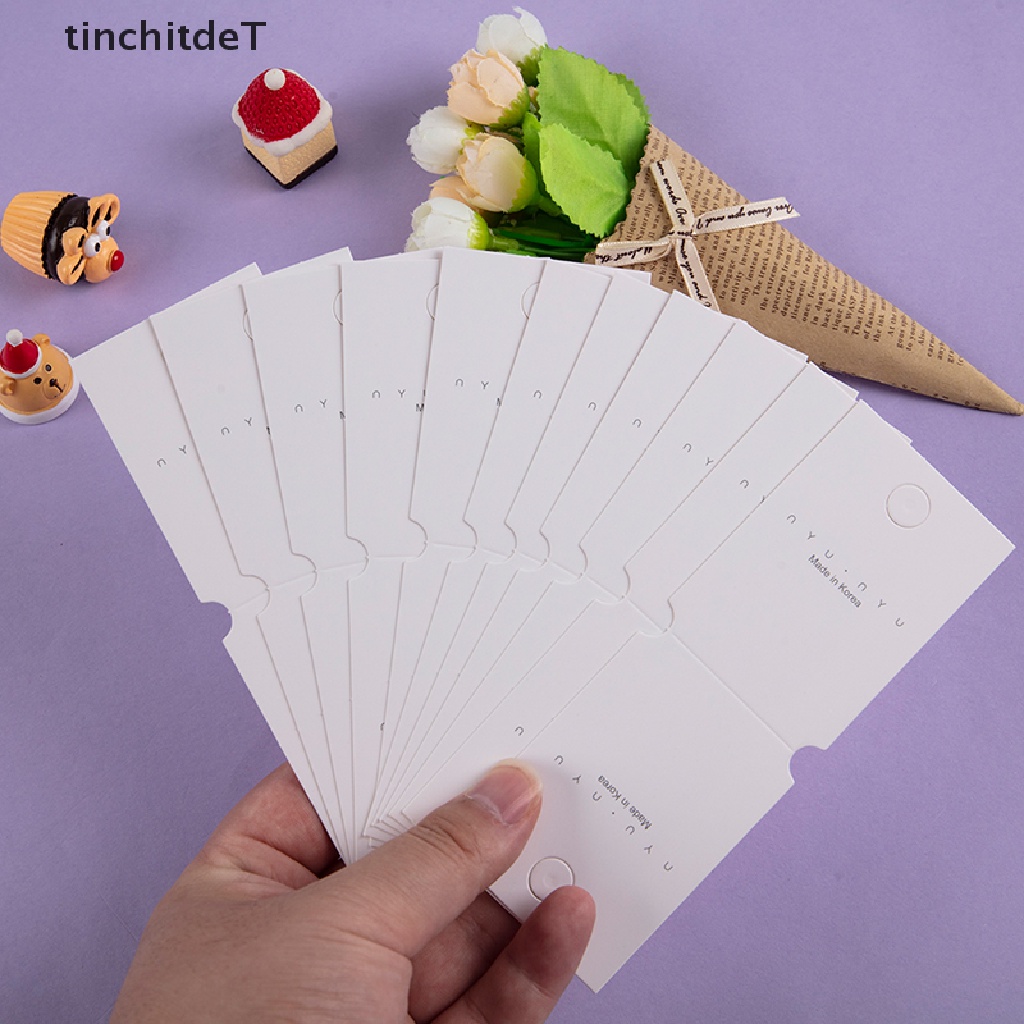 [TinchitdeT] [ขายดี] ป้ายแท็กกระดาษแข็ง แบบพับได้ สีขาว สําหรับแขวนแสดงเครื่องประดับ ต่างหู สร้อยข้อมือ ผม ยางรัดผม 50 ชิ้น