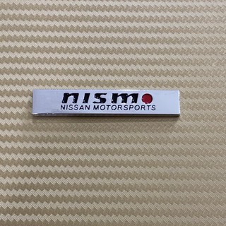 โลโก้* เพลท nismo งานโลหะ  ( ขนาด* 1 x 5.9 cm )ราคาต่อชิ้น