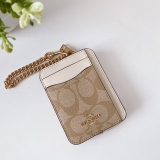 COACH ZIP CARD CASE IN SIGNATURE CANVAS