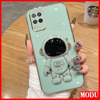 Modu เคสโทรศัพท์มือถือชุบไฟฟ้า ลายนักบินอวกาศ หรูหรา พร้อมขาตั้ง สําหรับ OPPO Realme 8 5G Realme Narzo 30 Realme V13 Realme Q3i 5G