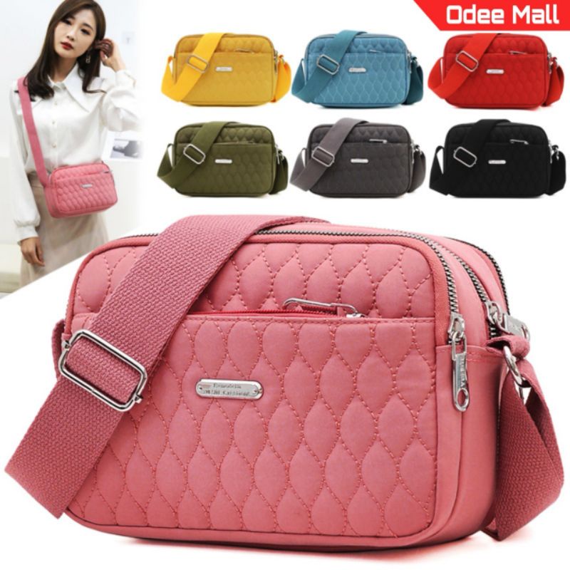พร้อมส่ง กระเป๋า​สะพาย​ข้าง​ สะพาย​ไหล่​ กระเป๋า​ผ้า​ คุณภาพเกินราคา​ 5​ ช่อง​ซิป​ มี​ 12​ สี​ให้​เลือก​ (OM792)​