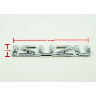 ป้ายโลโก้ Isuzu พลาสติกชุบโครเมี่ยมขนาด 2.5x12.5 cm ติดตั้งด้วยเทปกาวสองหน้าด้านหลัง