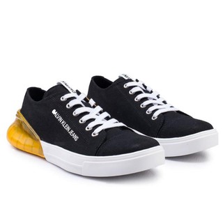 CALVIN KLEIN JEANS รองเท้าผ้าใบผู้ชาย | MUNRO CANVAS SNEAKERS IN BLACK LEMON CHROME