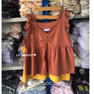 เสื้อทรงแขนตัดแต่งระบายแขน