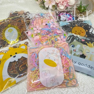ยางมัดผม ยางรัดผมใช้แล้วทิ้ง 10กรัม ใส่ถุงลายการ์ตูน