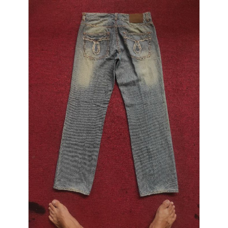 Calvin Klein กางเกงยีนส์ผ้ายีนส์ Calvin Klein แบบขาด