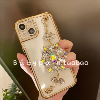 เคสโทรศัพท์มือถือ TPU นิ่ม แบบใส ปิดด้านหลัง ลายดอกไม้ ประดับเพชร พลอยเทียม วิบวับ พร้อมสายโซ่คล้องข้อมือ หรูหรา สําหรับ iPhone 11 12 13 Pro Max X XR XS 7 8 Plus