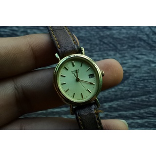 นาฬิกา Vintage มือสองญี่ปุ่น SEIKOJDM 3422 5040ระบบQuartz ผู้หญิง ทรงกลมวงรี กรอบทอง หน้าทอง หน้าปัด 25mm