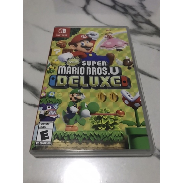 แผ่นเกม Super Mario Bros. U Deluxe (มือสอง) สำหรับเครื่อง Nintendo Switch และ Switch Lite