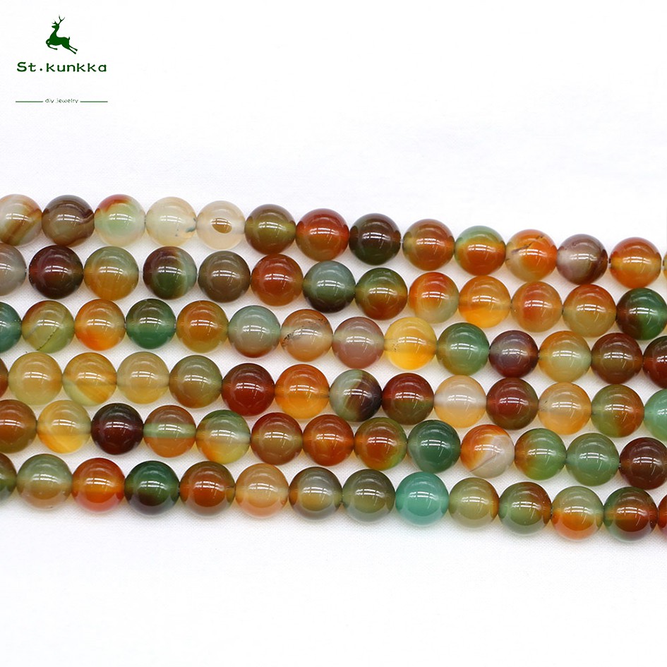 ลูกปัดกลมอาเกตนกยูงหินธรรมชาติ St.kunkka (1Strand/Lot)