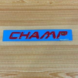 โลโก้* คำว่า CHAMP สีแดงขอบเงิน ( ขนาด*2 x 15 cm ) ราคาต่อชิ้น