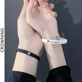 Champion สร้อยข้อมือยาง สร้อยข้อมือคู่ กำไลข้อมือซิลิโคน สไตล์กีฬา สีดำและสีขาว ลายตัวอักษร สำหรับผู้ชายและผู้หญิง