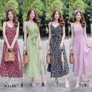 Maxi dress สายเดียวลายดอกเดซี่ ดีเทลแต่งสายไขว้ด้านหลัง