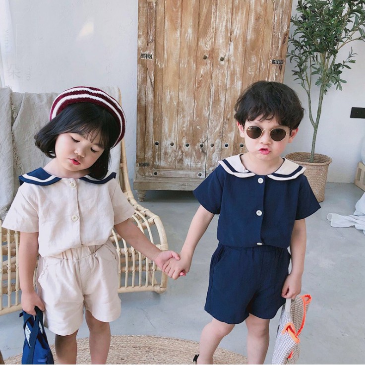 ชุดกะลาสีเด็ก สไตล์เกาหลี ชุดเสื้อผ้าฝ้ายคอตุ๊กตา ฤดูร้อนชายหญิงเสื้อยืดแขนสั้น + กางเกงขาสั้น ชิ้น สูท