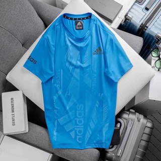 ADIDAS เสื้อยืดออกกำลังกายสกีนลายโลโก้ เนื้อผ้าโพลลิเอสเตอร์ 100%