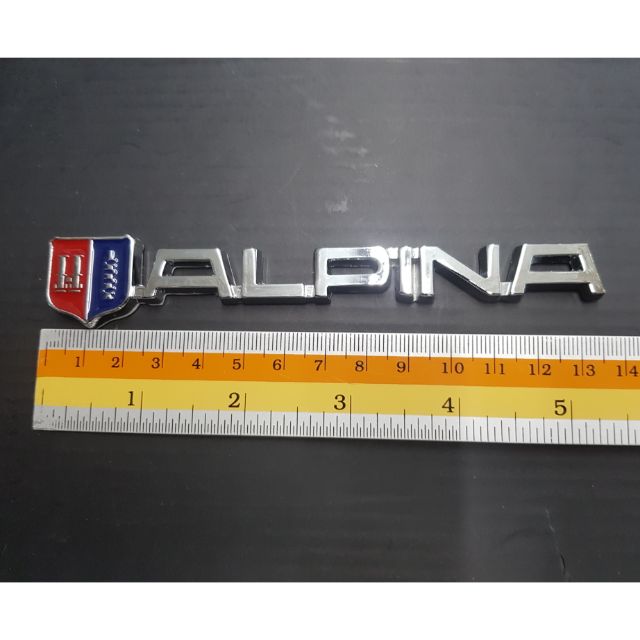 (Logo Alpina งานเหล็ก 13.5x1.5cm