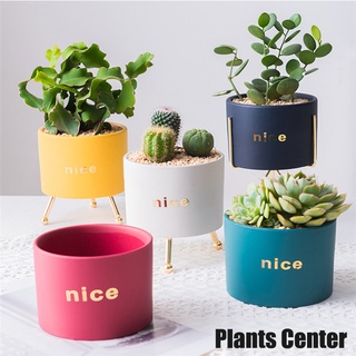 Plants Center พร้อมส่ง💥T028 กระถางต้นไม้ กระถางแต่งห้อง กระถางเซรามิกแบบใหม่ 5สี ทรงกระบอก มีขารองสีทอง แบบเด่นๆ