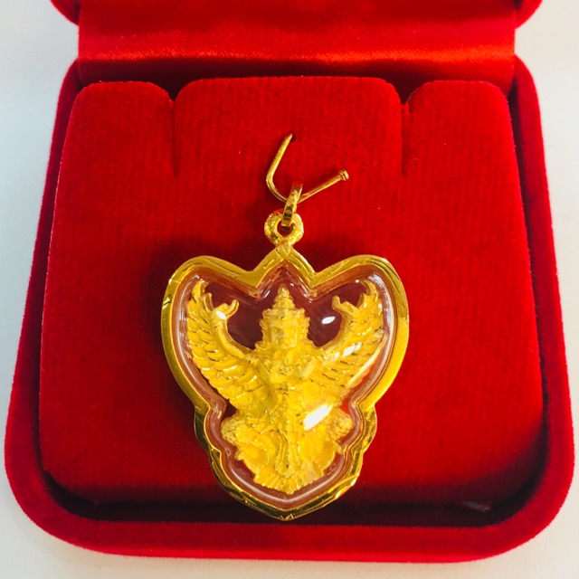 จี้พญาครุฑวัดพระยาสุเรนทร์เลี่ยมทอง ทองแท้75% เลี่ยมกันน้ำ ด้านหลังเป็นรูปถุงเงินถุงทอง  (ตัวองค์ครุ