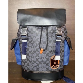 กระเป๋า Coach Rivington Backpack In Signature Canvas With Coach Patch (coachf79036)