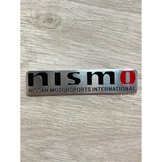 โลโก้NISMO เป็นงานอะลูมิเนียมบาง ขนาด 12.5x1.9 cm.