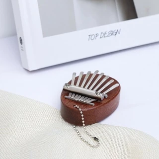 8 คีย์ kalimba มินินิ้วหัวแม่มือเปียโนอะคูสติกเปียโนนิ้วเครื่องดนตรี Sapele ไม้