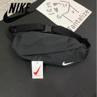 Nike ผู้ชายและผู้หญิงรุ่นเกาหลีของกระเป๋าหน้าอกป่าวิ่งเอวกระเป๋ากีฬากลางแจ้งกระเป๋าสะพายไหล่เดียวกระเป๋า messenger