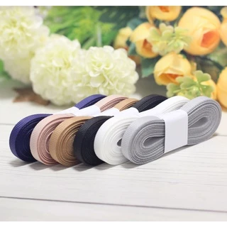 ริบบิ้นผ้ากรอสเกรน ขนาดหน้ากว้าง 0.6 cm ยาวม้วนละ 5 หลา มีให้เลือก 64 สี