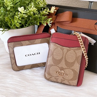 COACH ZIP CARD CASE IN SIGNATURE CANVAS