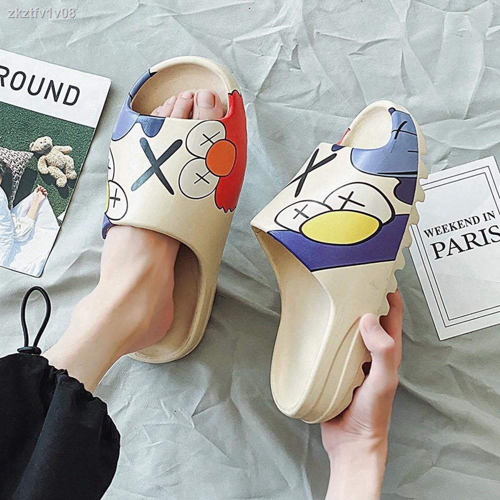 kaws slides yeezy