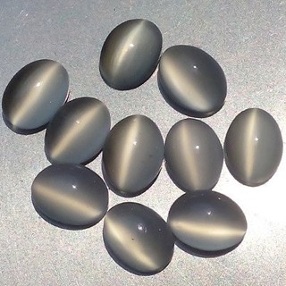 พลอย ตาแมว มูนสโตนแท้ (Natural cats eye Moonstone) 13.90 กะรัต (Cts.)