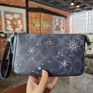 COACH NOLITA 19 IN SIGNATURE CANVAS WITH SNOWFLAKE PRINT