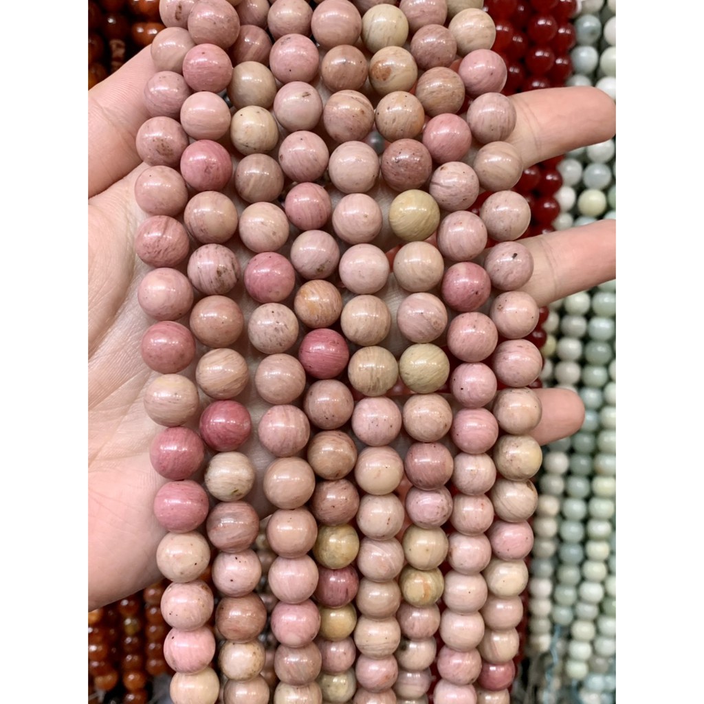 โรโดไนท์ Rhodonite หินแห่งความรักความอ่อนโยน คัดสีพิเศษ ทรงกลม เส้นยาว