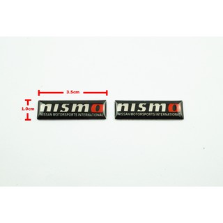 ป้ายโลโก้ เลซิ่น NISSAN NISMO ดำ ขนาด 3.5.X1.0 cm ติดตั้งด้วยเทปกาวสองหน้าด้านหลัง