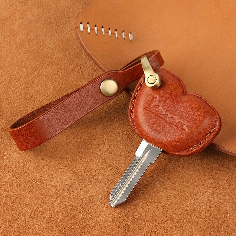 Suitable for Piaggio VESPA key cover LX LXV LXS GTS300 spring sprint 150 motorcycle key leather keyc