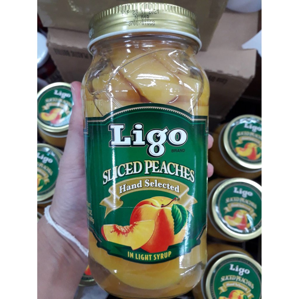 ลูกพีชในน้ำเชื่อม พีชในน้ำเชื่อม พีช 680กรัม ลิโก้ Ligo Sliced Peaches Hand Selected in Light Syrup