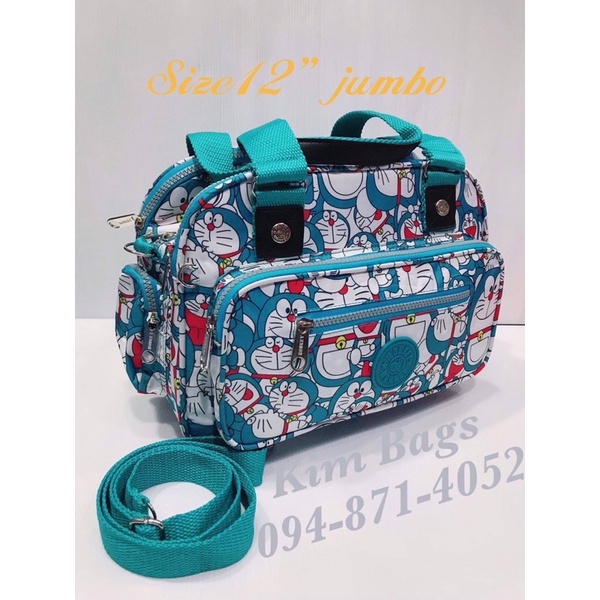 DORAEMON KITTY ราคาล้างสต๊อกโกดัง กระเป๋าสะพายโดเรม่อนคิตตี้มิกกี้เมาส์ 12 นิ้ว